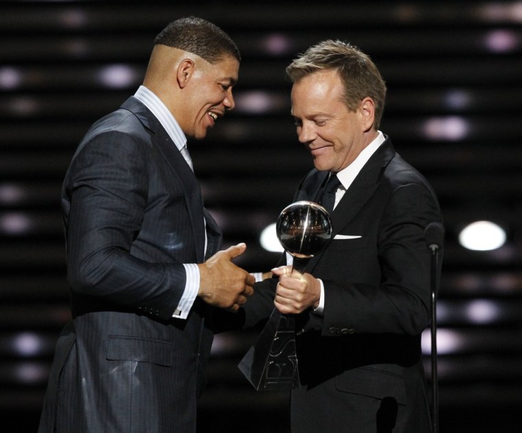 Image: Actor Kiefer Sutherland presents the Arthur Ashe Courage Award to former boxer Dewey Bozella at the 2011 ESPY Awards in Los Angeles