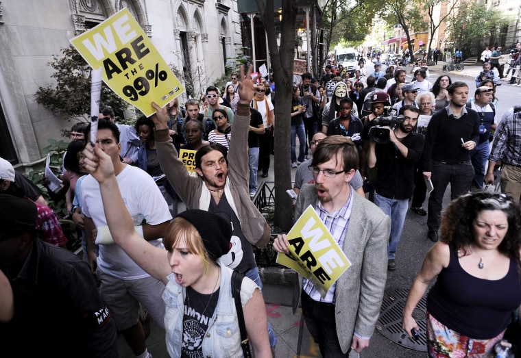 Image: Occupy Wall Street and others march in wealthy neighborhood of New York City