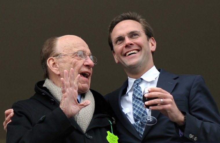 Image: Rupert Murdoch and his son James attend the Cheltenham Racing Festival in 2010.