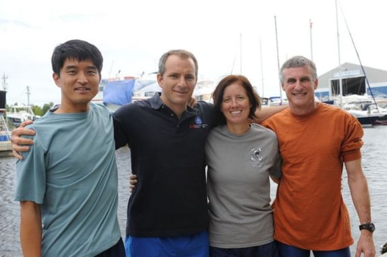 Four members of the NEEMO 15 crew who were forced to return to the surface Wednesday, six days ahead of schedule, because of concerns over Hurricane Rina. From left to right: Japanese astronaut Takuya Onishi, Canadian astronaut David Saint-Jacques, NASA astronaut Shannon Walker and planetary scientist Steve Squyres.