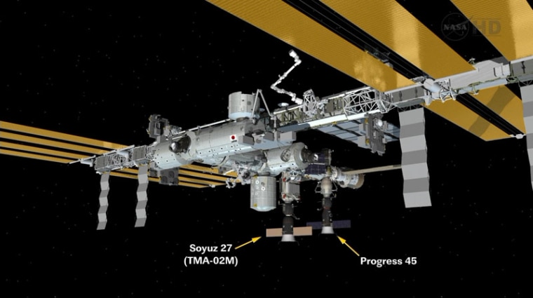 Graphic shows Progress 45 unmanned cargo ship after docking