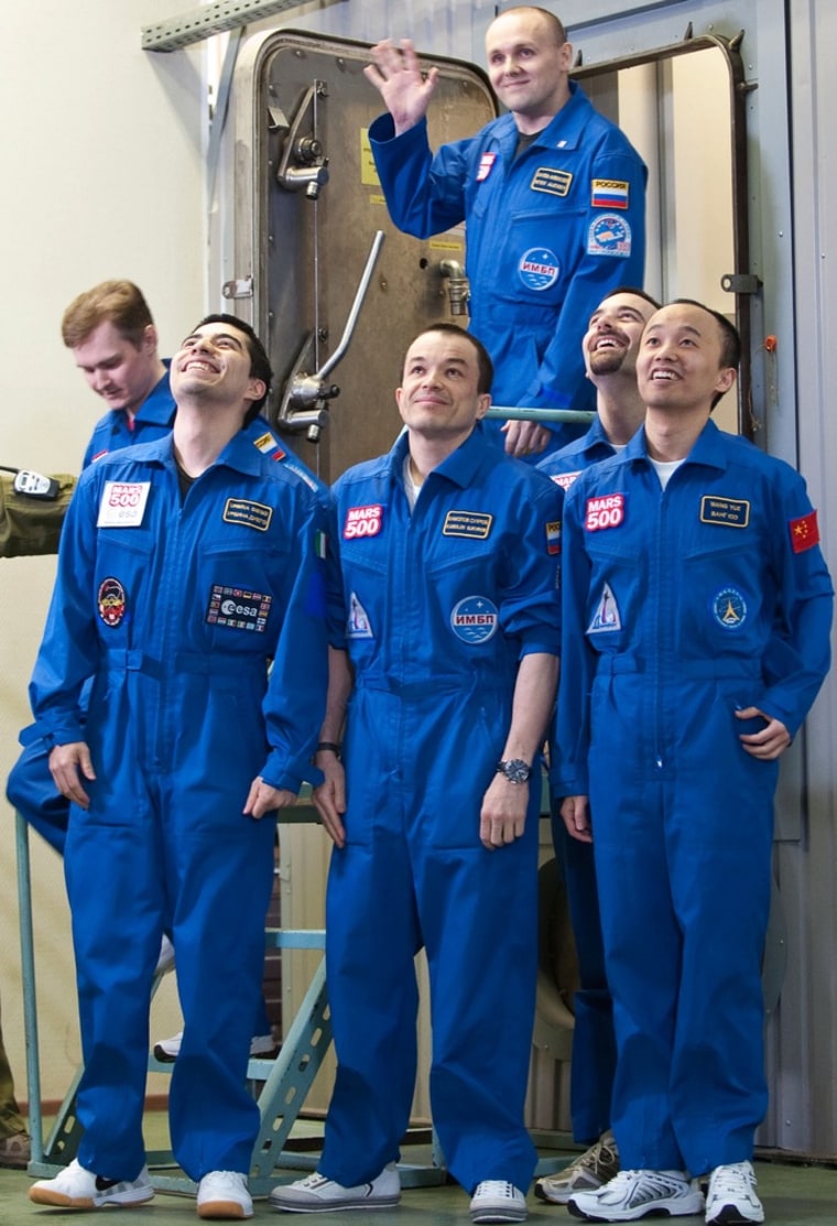Image: The crew emerges from the simulator