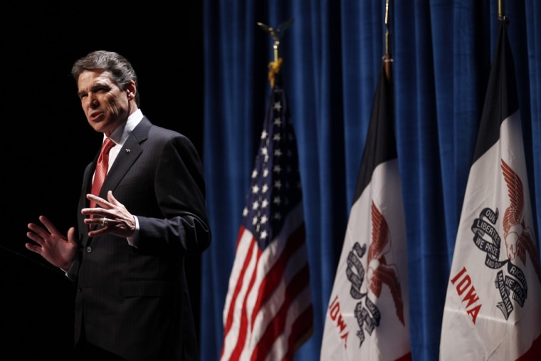 Image: U.S. Republican presidential candidate and Governor of Texas Rick Perry speaks at the annual Republican Party of Iowa Ronald Reagan Dinner in Des Moines, Iowa