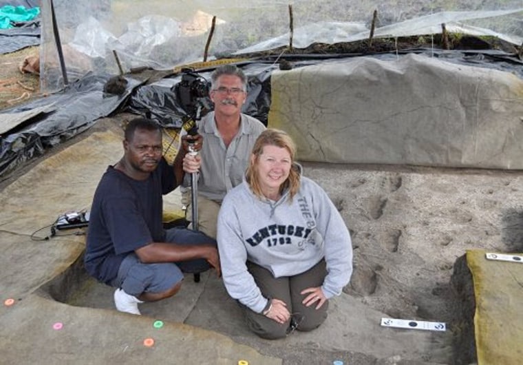 U.S. Bureau of Land Management team members Tom Noble, center, and Neffra Matthews, right, partner with the government of Tanzania in a recent re-excavation of the famous early hominid footprints discovered by the Leakeys at Laetoli in Tanzania.