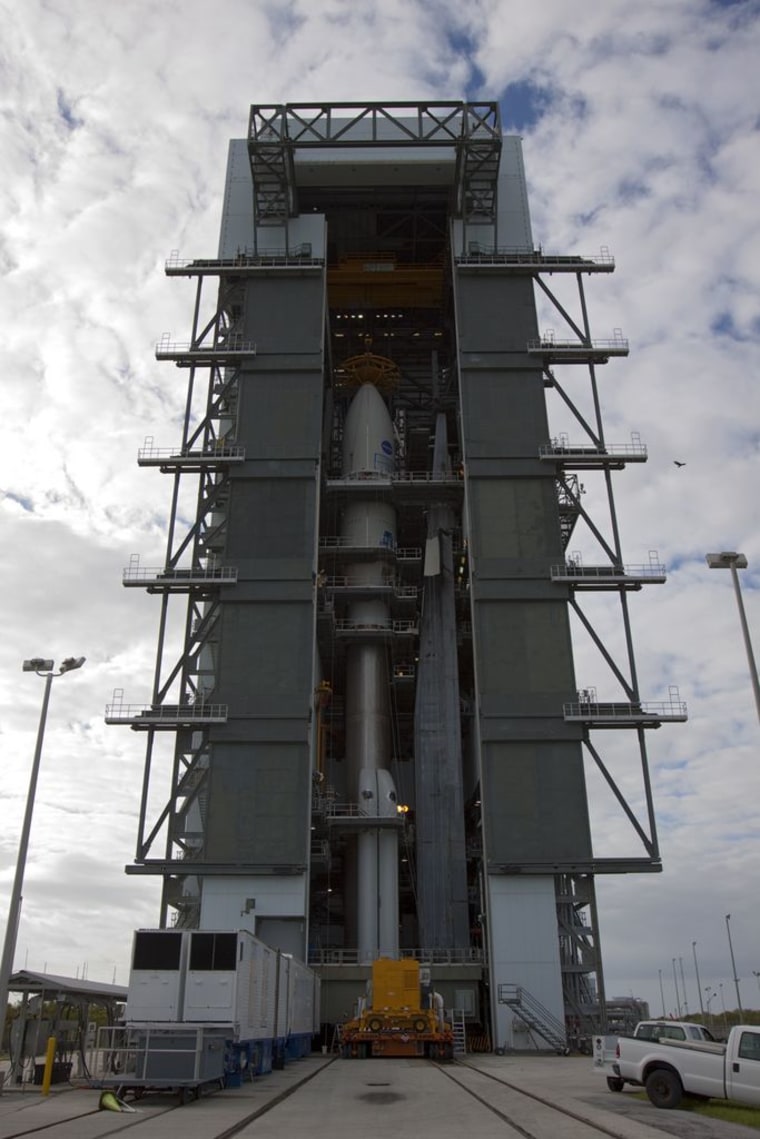 NASA's Curiosity Mars rover was hoisted atop its Atlas 5 rocket on Nov. 3 in preparation for its launch Saturday.