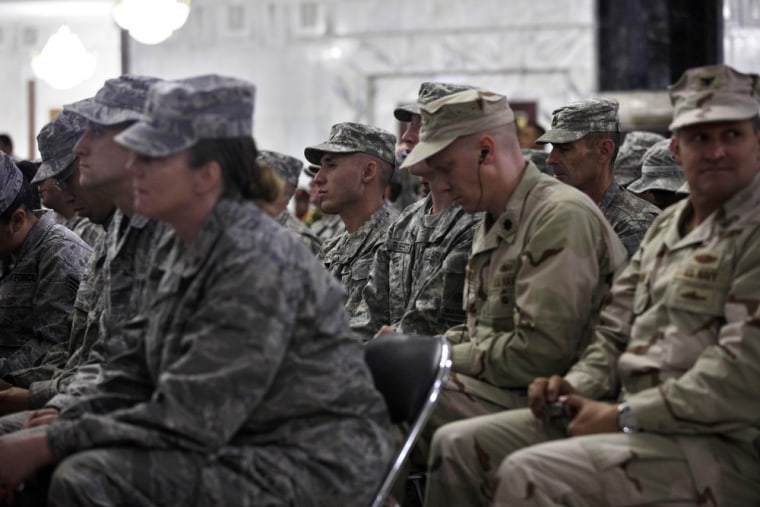 Image: U.S. soldiers attend a special ceremony at Camp Victory, one of the last American bases in this country where the U.S. military footprint is swiftly shrinking.