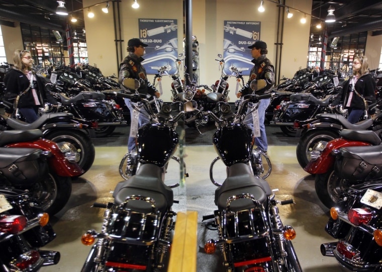 Image: Customers at Harley Davidson dealership