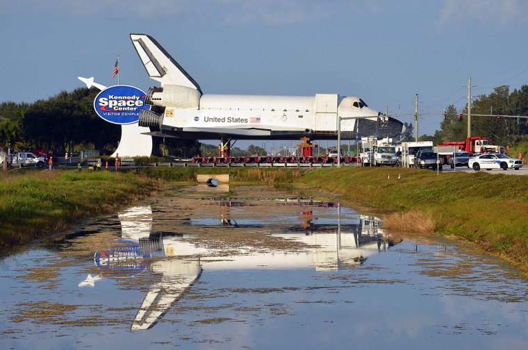 After almost two decades, a full-size space shuttle model was moved on Sunday from Kennedy Space Center Visitor Complex to make space for a real shuttle. The replica Explorer was trucked on a transporter to a turn basin about five miles away, where in a few months it will depart via barge to Texas for display at Space Center Houston.