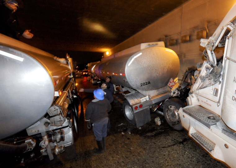 Multiple big rigs crash on wet L.A. highway