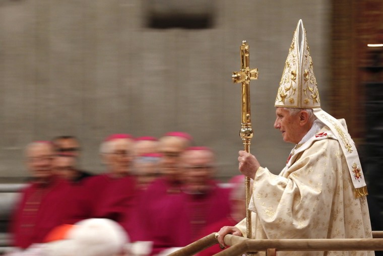 Image: Pope Benedict XVI arrives to lead the Christmas mass in Saint Peter's Basilica at the Vatican