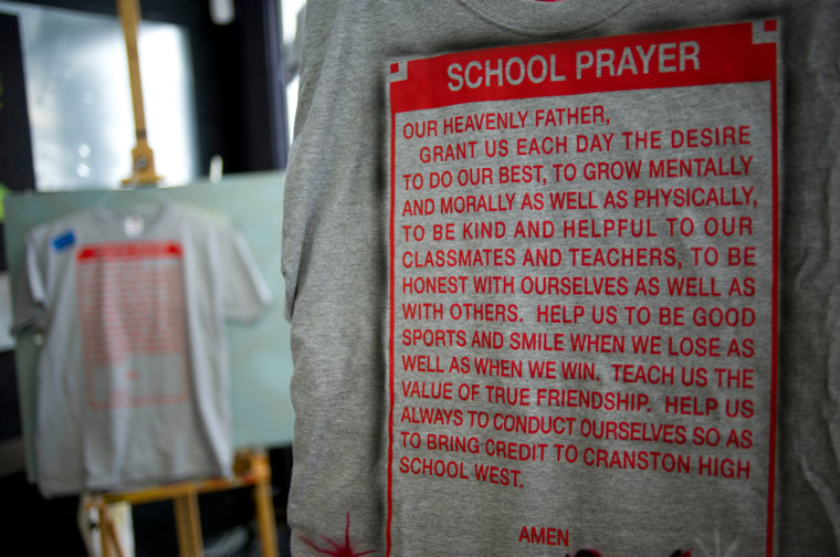 Image: T-shirts displaying the Cranston High School West's school prayer.