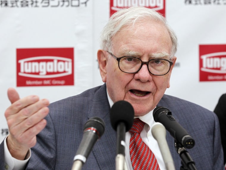 Image: Berkshire Hathaway Chairman Warren Buffett speaks at a news conference after the opening ceremony of Tungaloy Corp's new plant in Iwaki