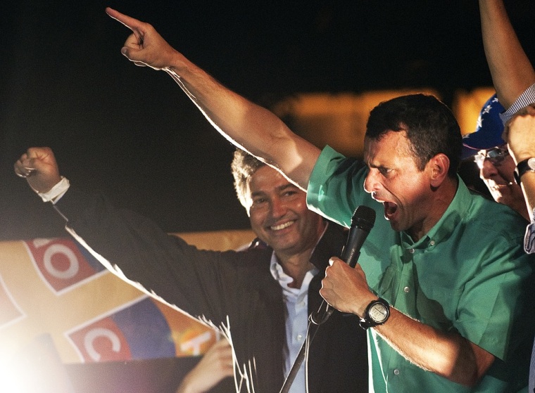 Image: Venezuelan opposition leader Henrique Capriles Radonski celebrates after winning the primary elections in Caracas
