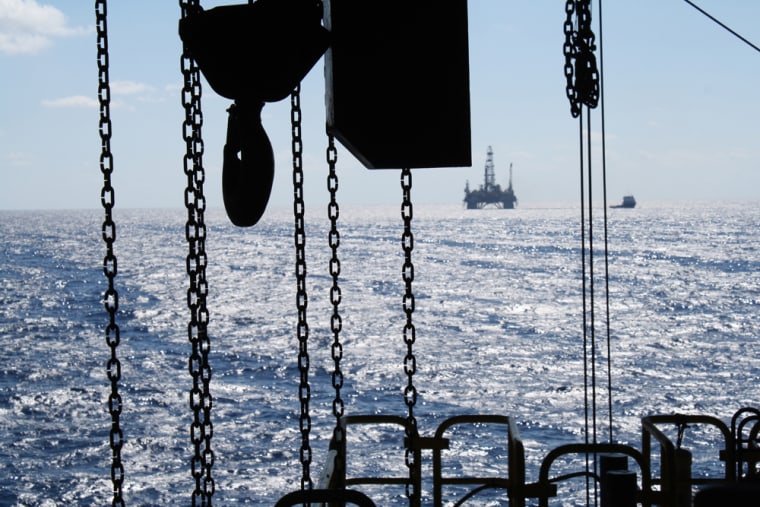 Image: The satellite oil rig \"Danny Adkins,\" owned by Noble Oil, can be seen on the horizon from the Perdido platform.
