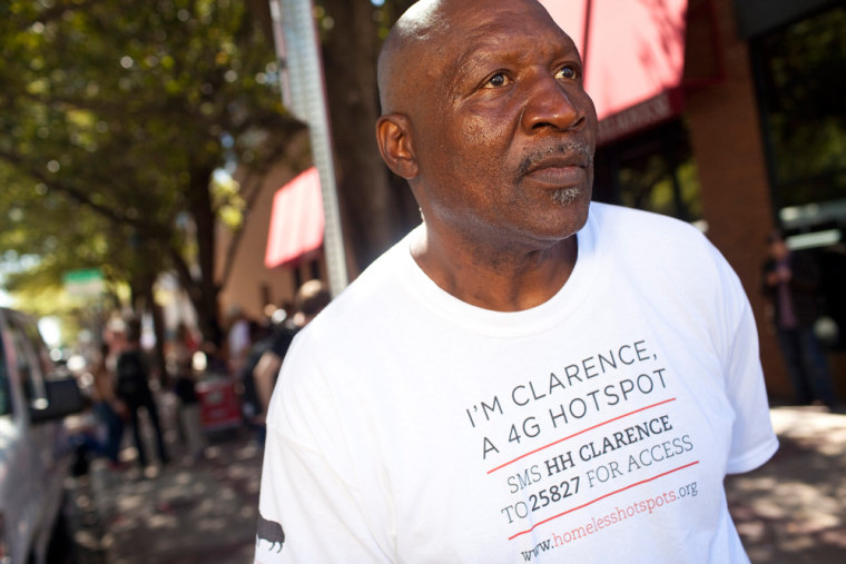 Image: Clarence Jones, a homeless man, works for BBH Labs as a mobile hotspot during the South by Southwest technology conference in Austin, Texas.