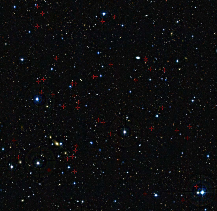Each of the galaxies, marked by the red crosses, were seen as they were between 3 billion and 5 billion years after the Big Bang. These galaxies, located in the constellation of Cetus (The Sea Monster), were studied in detail using the European Southern Observatory's Very Large Telescope.