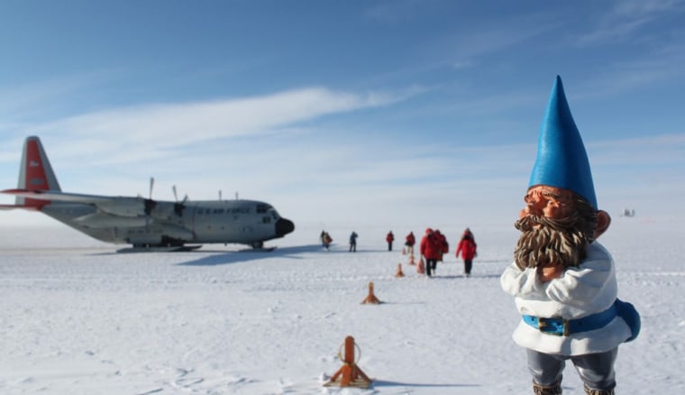 Here, the gnome is standing at the Antarctic South Pole. Turns out, the gnome weighs more at the South Pole than at the equator — and you do, too.
