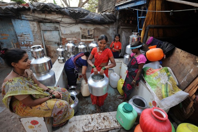 Image: Women collect water