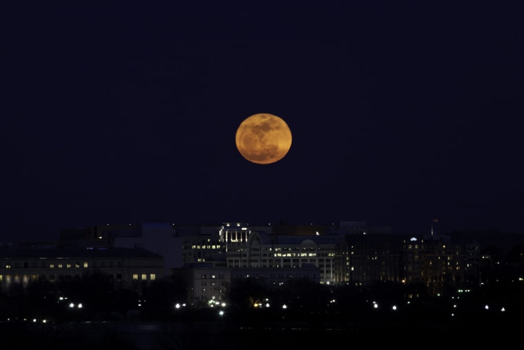 Photographer Sandy Adams snapped this great view of the "supermoon" full moon of March 19, 2011 over Washington, D.C.