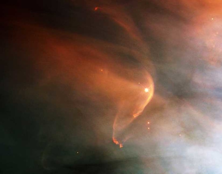 Shown in a Hubble Space Telescope image, the "astrosphere" around the star L.L. Orionis approximates the heliosphere around our solar system.