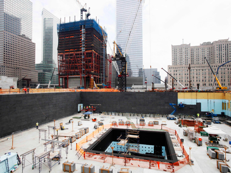 Image: Construction continues on the National September 11 Memorial and Museum, bottom, in New York on Aug. 10, 2010.