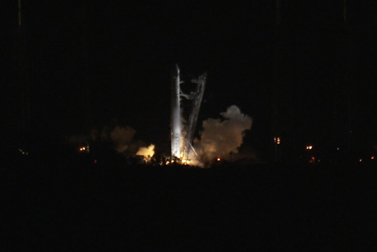 SpaceX's first Falcon 9 rocket launching toward the International Space Station ignites its nine main engines briefly in this NASA photo shortly before aborting the launch try on Saturday due to an unexpected engine sensor reading.