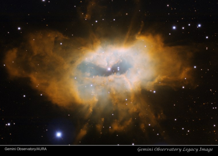 The planetary nebula Sharpless 2-71, as imaged by the Gemini Multi-Object Spectrograph on Gemini North in Hawaii. The long-assumed central star is the brightest star near the center, but some astronomers wonder if the dimmer and bluer star (just to the right and down a bit) might be the parent of this object.