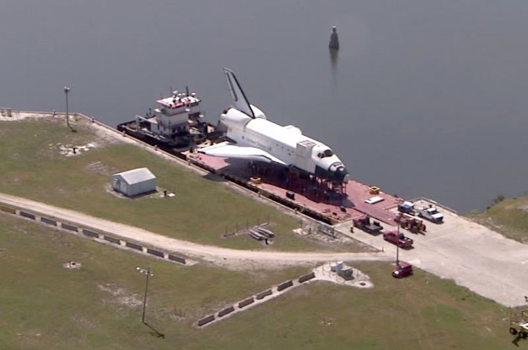 A mockup of a NASA space shuttle sits atop the barge taking it Houston, Texas, on Wednesday, the day before it left from the Kennedy Space Center in Florida.