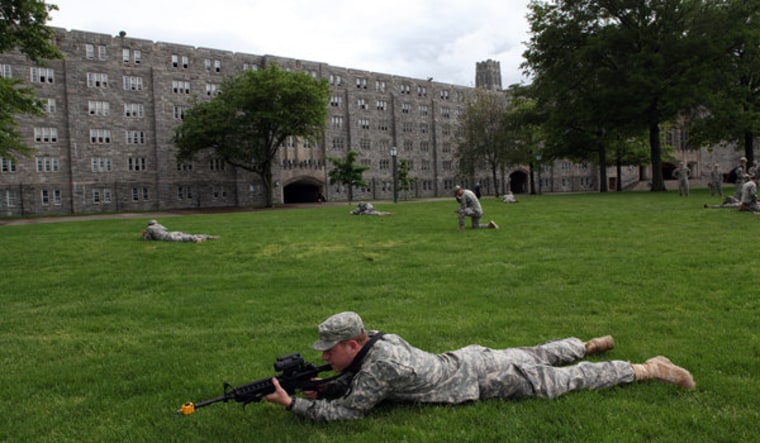 Members of the class of 2013 at the United States Military Academy practice for coming military maneuvers in the field. 