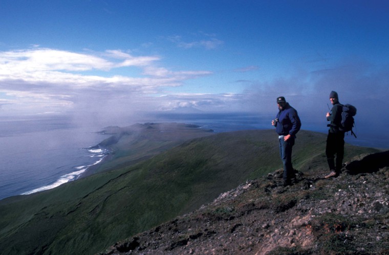 U.S. Fish and Wildlife Service biologist Jeff Williams and Art Sowls at a high point on Rat Island in the Aleutians. Alaska.