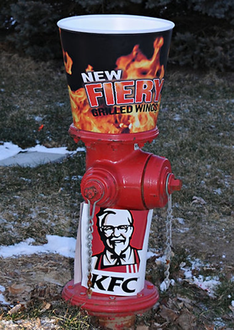 KFC repaired hydrants in Brazil, Ind., while also branding them with the KFC and Fiery Grilled Wings logos.