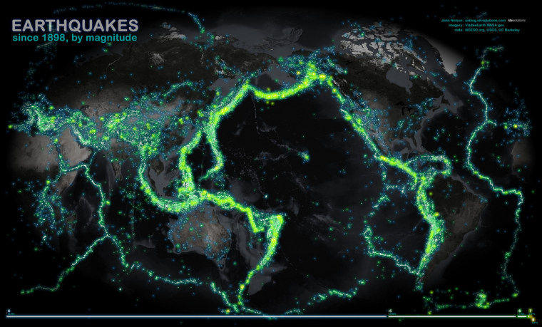 More than 100 years of earthquakes glow on a world map.