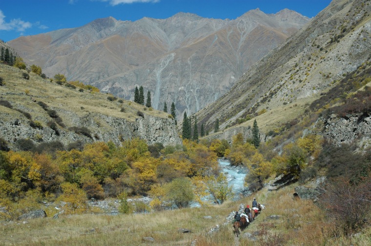 The research team descending China's Tian Shan Mountains, where they found evidence that super-heated water can pierce rock deep underground in just 200 years.