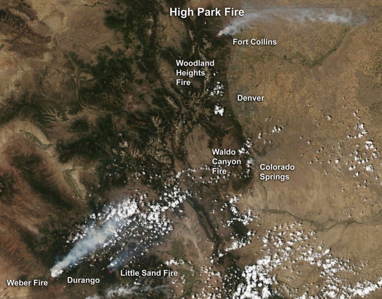 Image: Handout satellite image of wildfires burning across Colorado