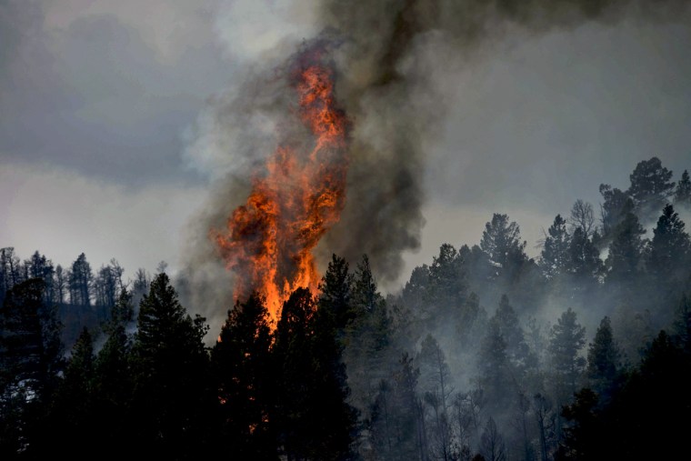 Firefighters battled several fires in Colorado in June 2012, with the conflagrations destroying huge amounts of acreage and hundreds of homes.