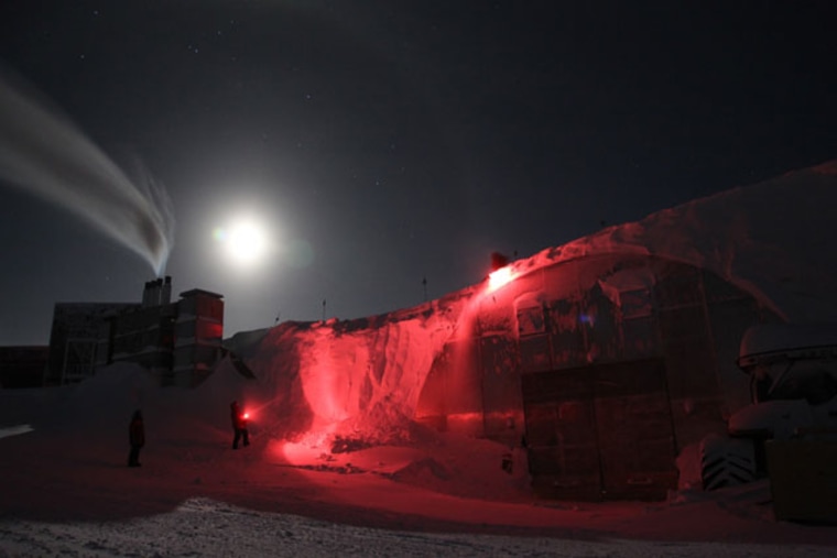 A supermoon lights the way for South Pole workers facing unrelenting darkness in May.