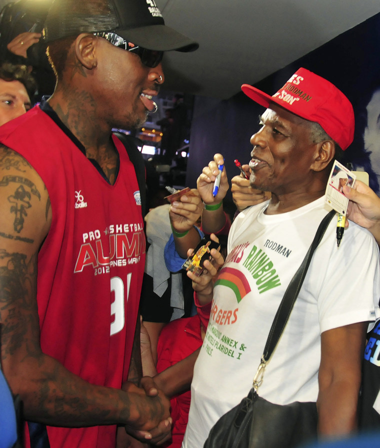 Image: Former NBA star Dennis Rodman meets his estranged father