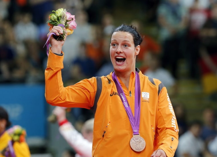 Image: File photo shows Bronze medallist Edith Bosch of the  Netherlands as she celebrates after awards ceremony for women's -70kg final judo competition at London 2012 Olympic Games