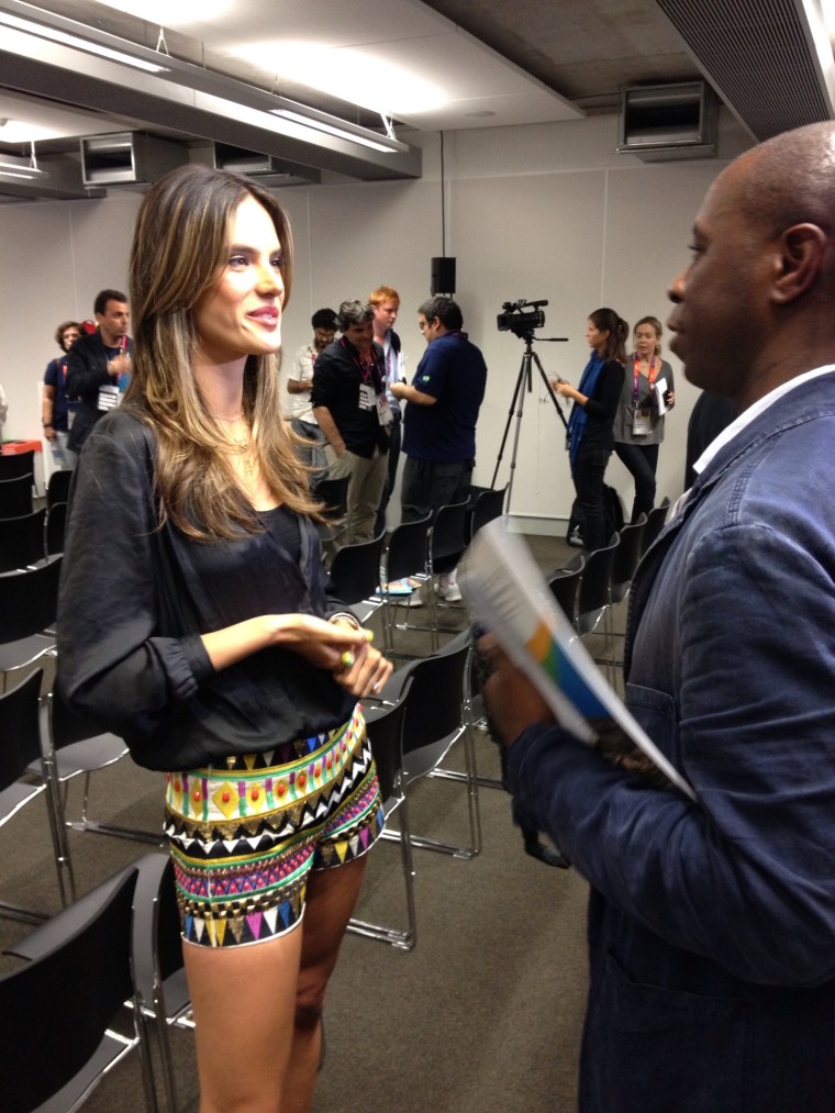Brazilian model Alessandra Ambrosio, who will take part in Sunday's Olympic handover ceremony, speaks to reporters in London on Friday. Rio will host the 2016 Summer Olympics