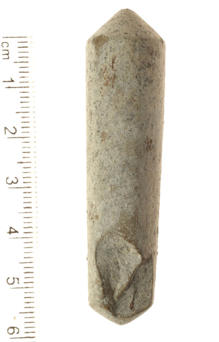 Cylinders like this one discovered at an 8,000-year-old Israeli site were used to make fire, researchers say.