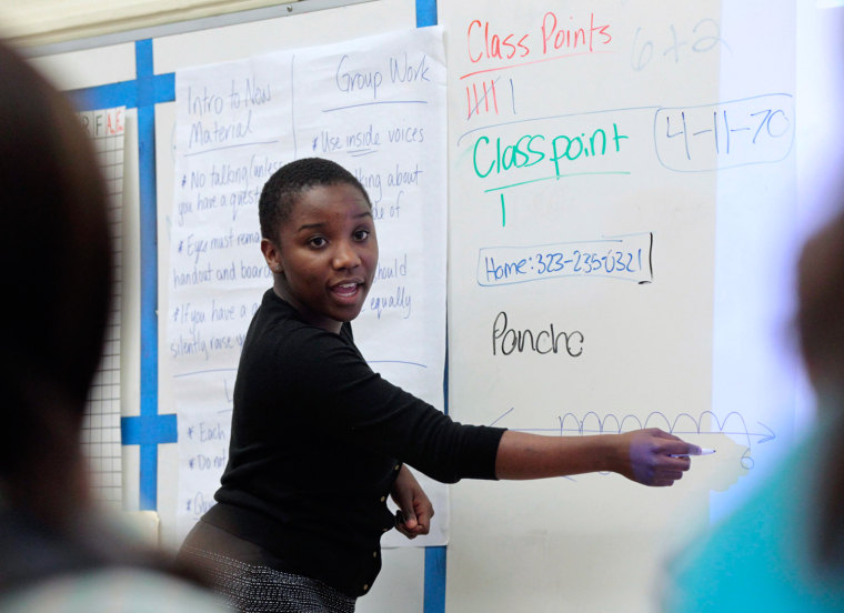 Image: Trainee math teacher Shaw from Teach for America program teaches class at George Washington Carver Middle School in Los Angeles