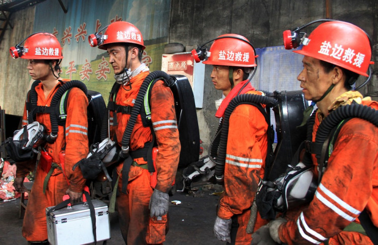 Image: Rescuers prepare to head to search for survivers at a coal mine after a gas explosion in Panzhihua, southwest China's Sichuan province