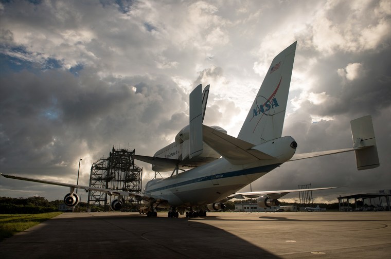 Space shuttle Endeavour, atop NASA's Shuttle Carrier Aircraft, or SCA, is shown at the Shuttle Landing Facility at NASA's Kennedy Space Center on Monday.