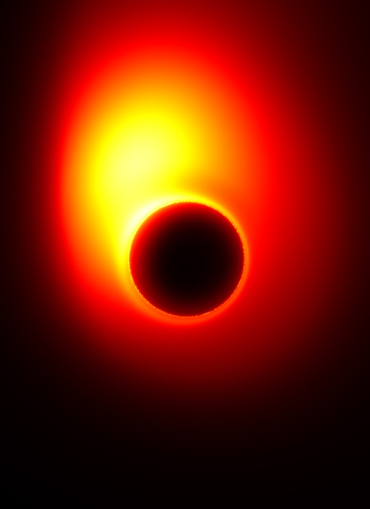 This image from a simulation shows an energy jet launched from a spinning black hole surrounded by a disk of accreting material. The black hole is spinning at half the maximum rate, and its mass is that of the black hole at the center of the M87 elliptical galaxy. The central black hole "shadow" due to extreme light bending is apparent in this simulation.