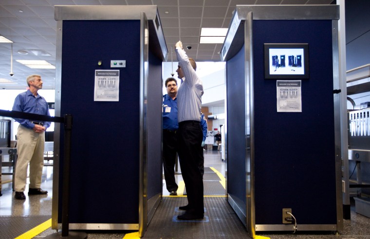 Image: TSA employees demonstrate a new full-body backscatter scanner