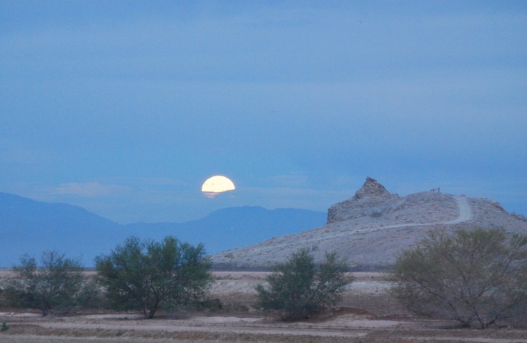 Moonset at Rock Hill, one of five volcanoes that comprise the Salton Buttes. The buttes last erupted between 940 and 0 B.C., not 30,000 years ago, as previously thought, a new study finds.