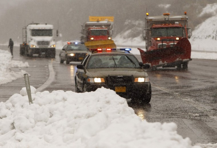 Image: Snowplows open Interstate 68 in Garrett County in western Maryland