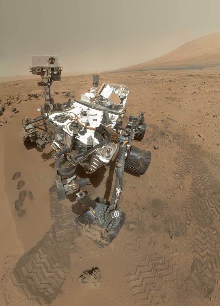NASA's rover Curiosity used its Mars Hand Lens Image to snap a set of 55 high-resolution images on Wednesday. Researchers stitched the pictures together to create this full-color self-portrait.
