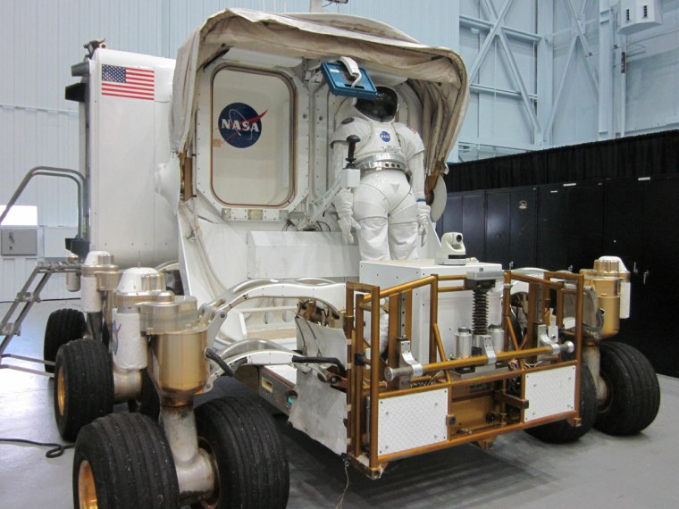 A mockup of NASA's next generation moon rover, the Space Exploration Vehicle (SEV), on display at the agency's Johnson Space Center in Houston. The SEV has since been converted into a wheel-less vehicle designed for visiting asteroids.