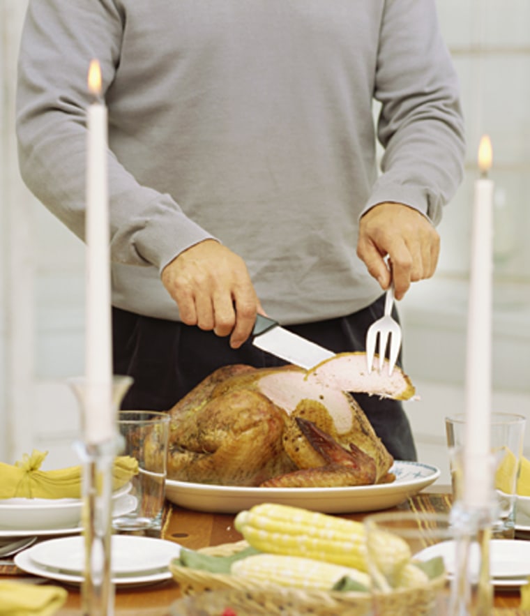 Man cutting turkey